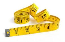 measure tape to measure a machine belt